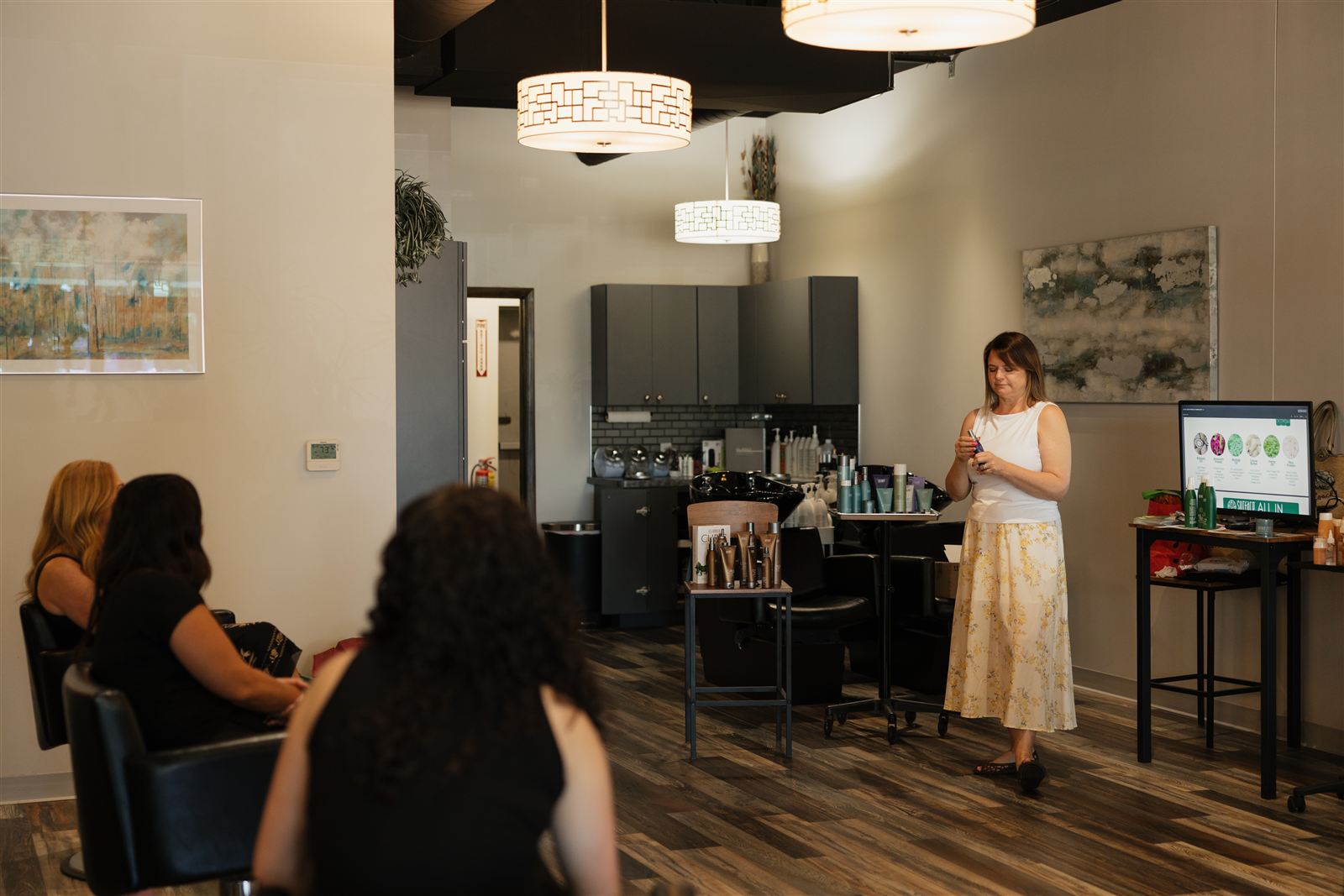 Duality Salon stylists attending an in-salon education class